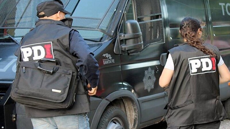 La policia de Investigaciones La policia de Investigaciones